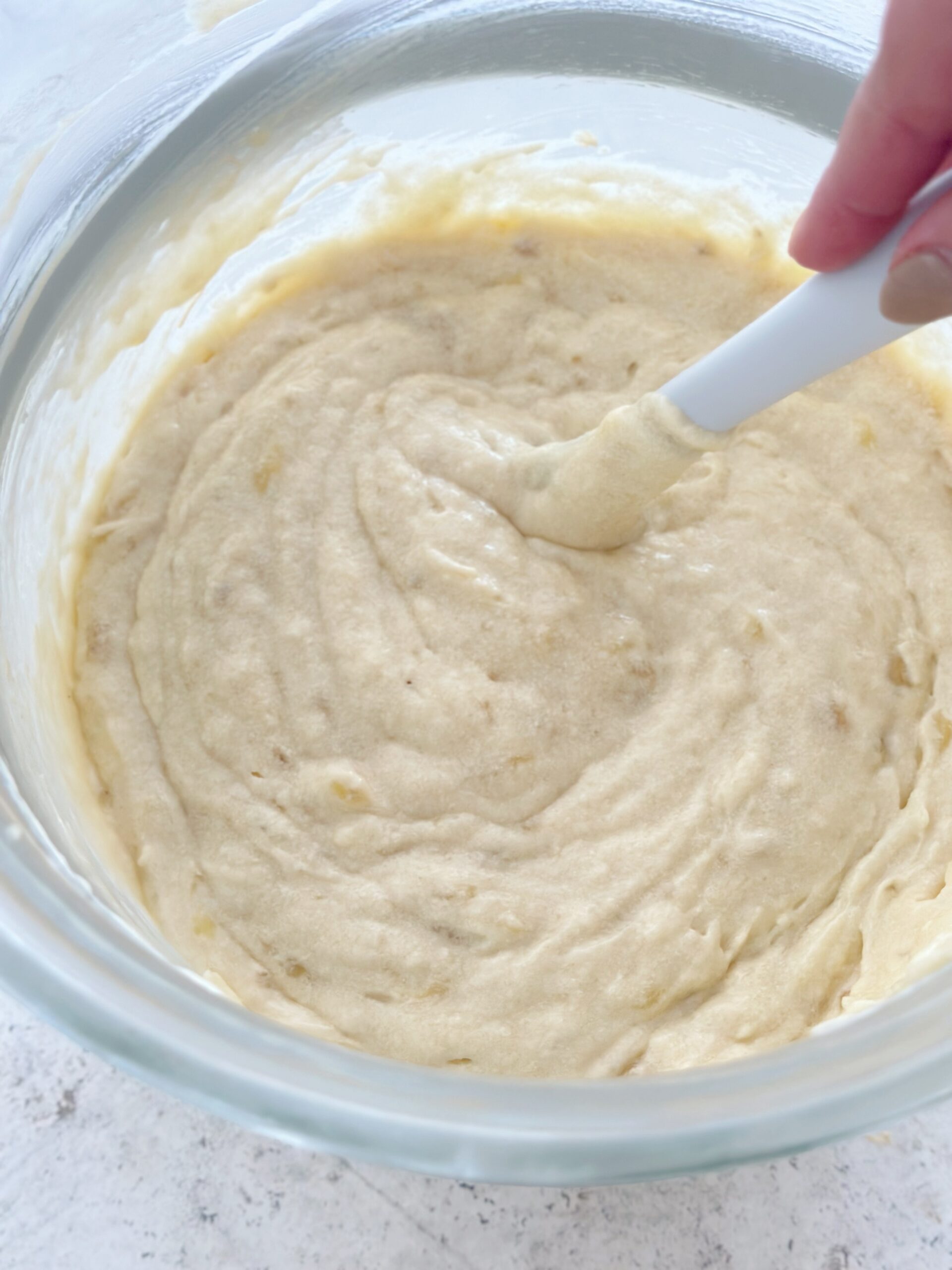 Bananas folded into cake batter